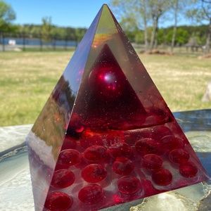 Red pyramid inside a pyramid art piece